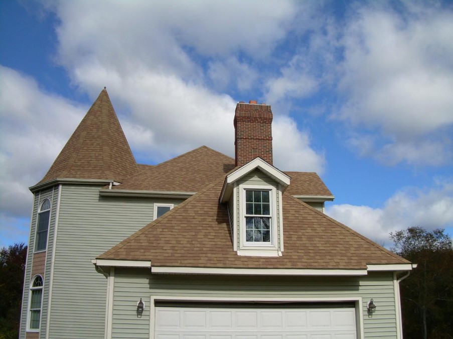 Traditional house with brick chimney.